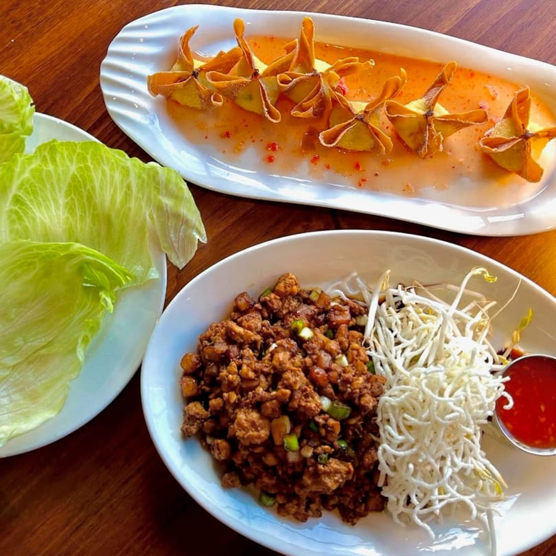 J Liu of Dublin's crab rangoon, lettuce wraps with chicken, bean sprouts, and crispy noodles.