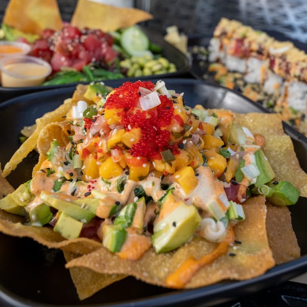 J Liu of Dublin's tuna nachos with mango, avocado, and red roe on crispy wontons.