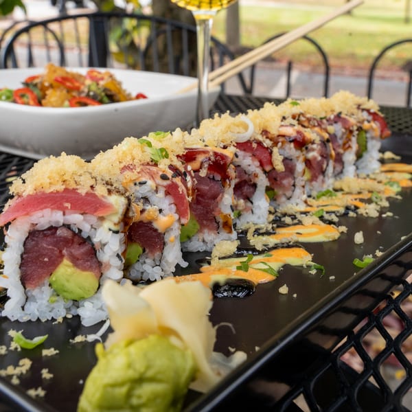 J Liu of Dublin's tuna and avocado sushi roll, topped with crispy tempura flakes and sauces.